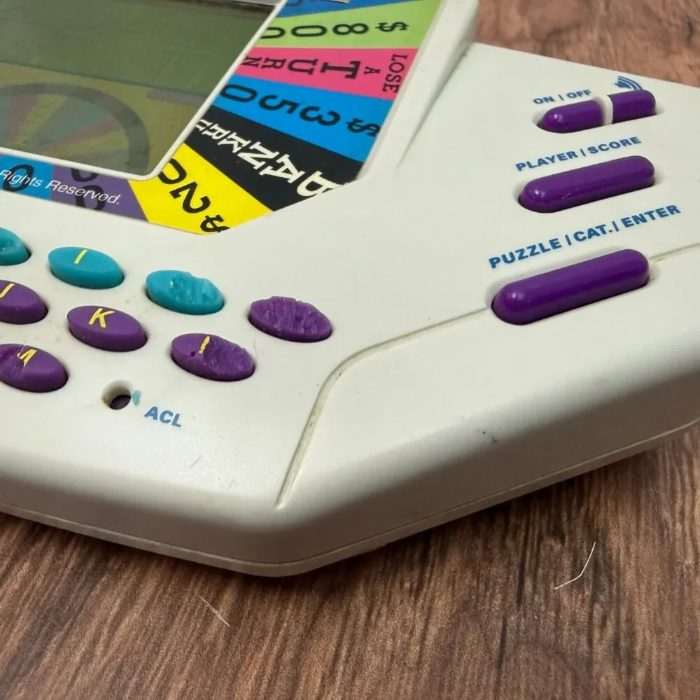 Vintage Wheel of Fortune Tiger Electronics Handheld Game 1995